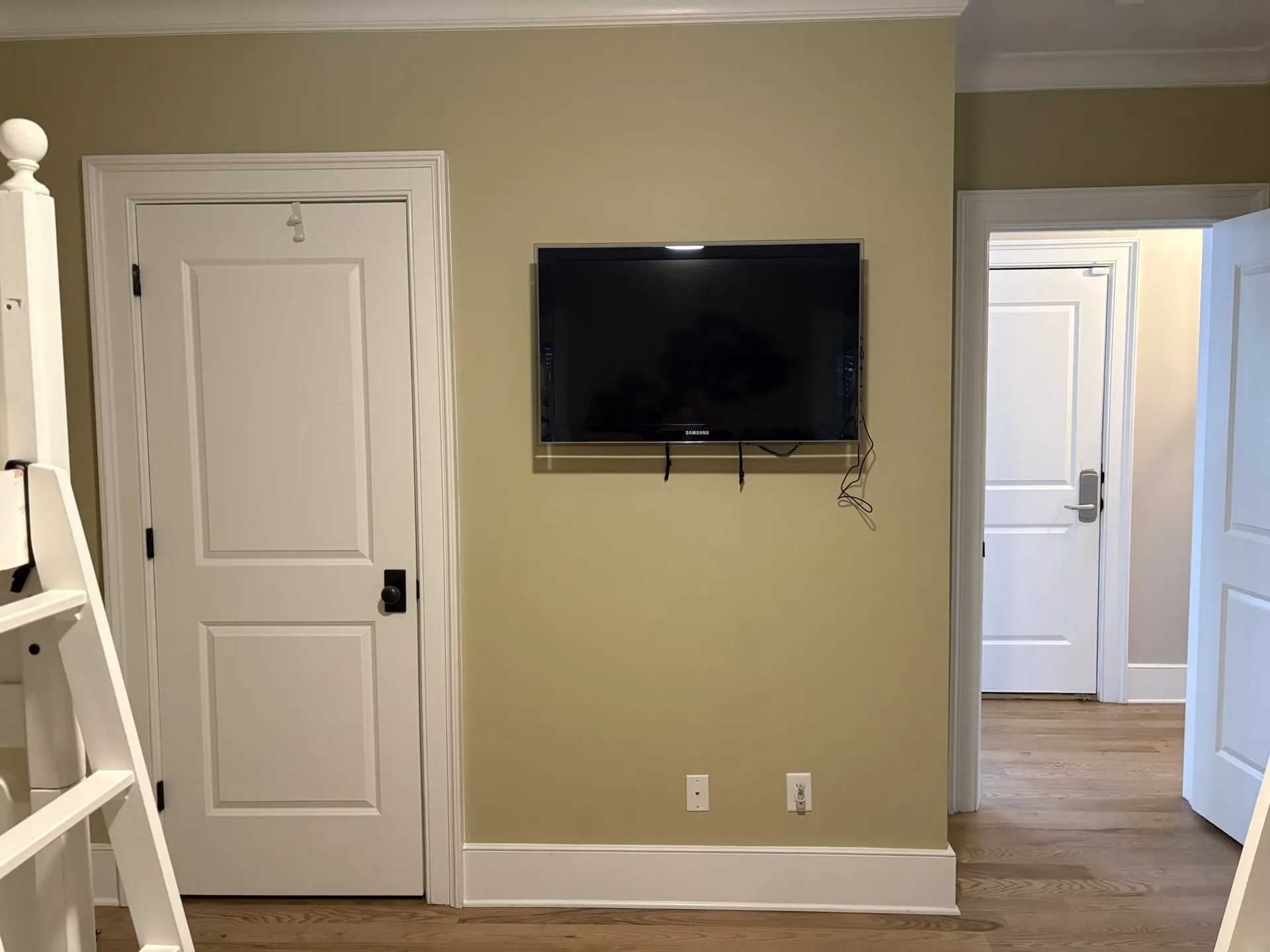 Bunk bedroom with built-in reading lights and individual curtain panels